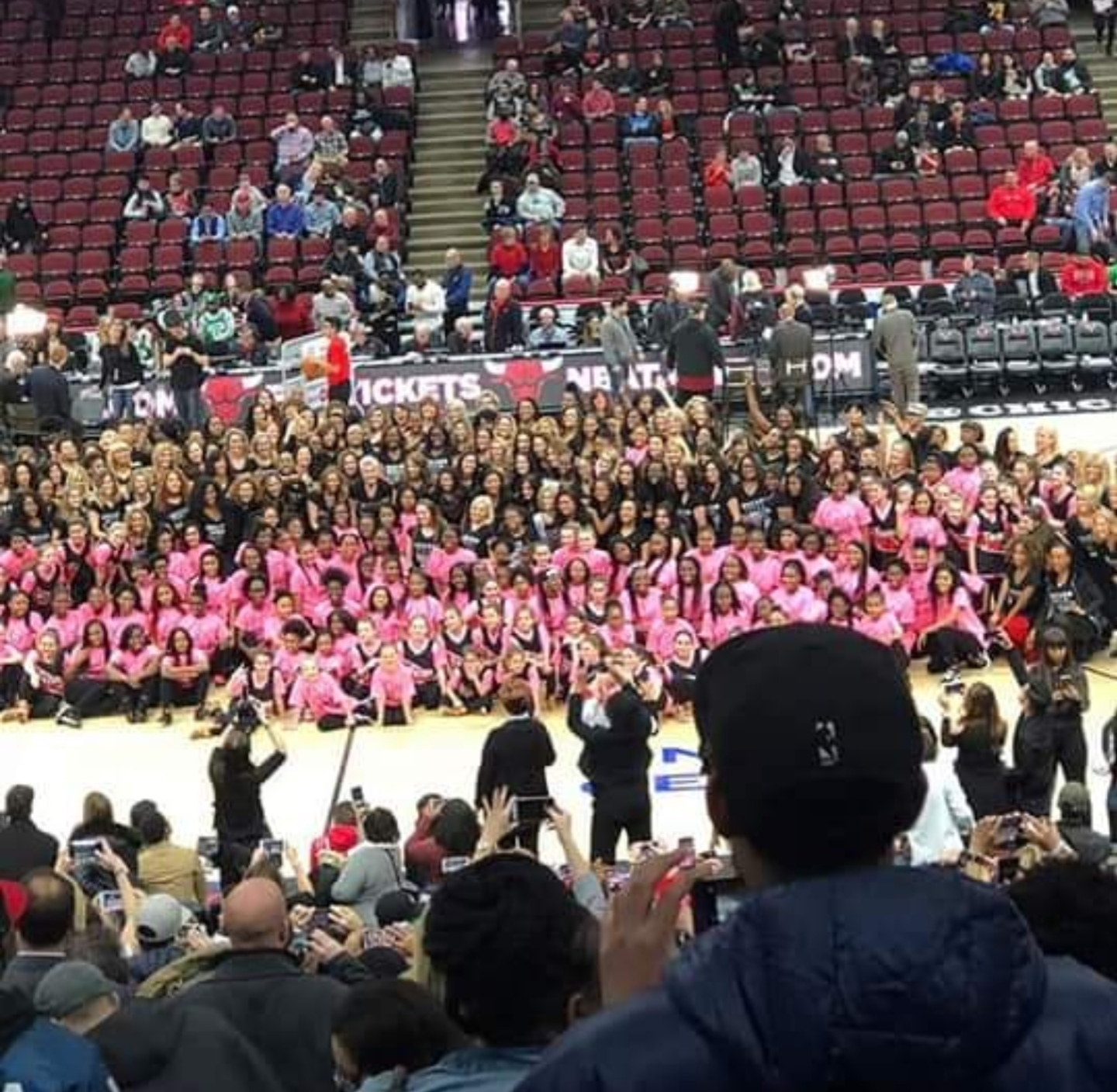 A large Endure community group gathered on the United Center floor