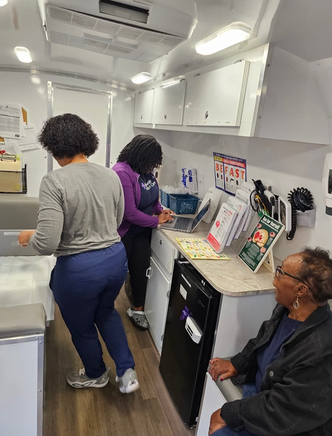 Community members inside a wellness and care space